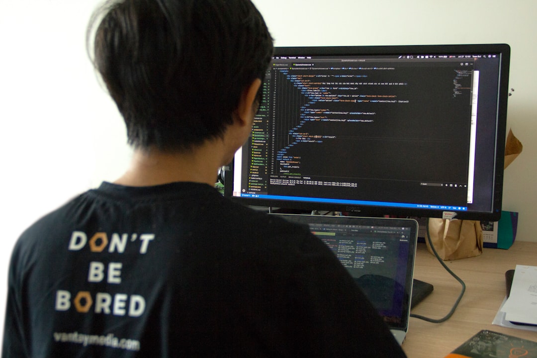 Developer auditing WordPress theme code for Interaction to Next Paint performance