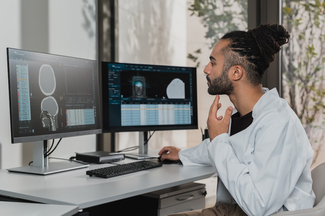 Comparison of Google and Bing image search interfaces on a designer workstation 2026